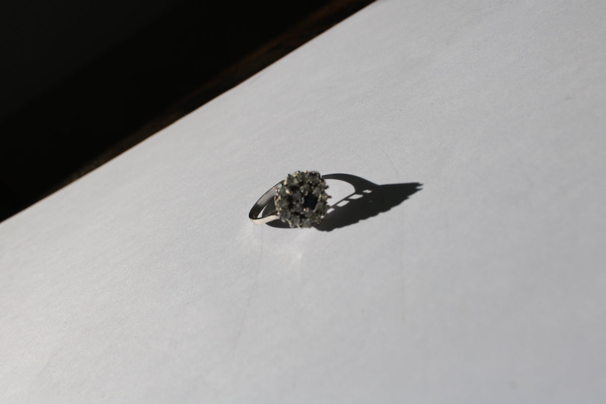Sterling Silver Ring with Blue Centre Stone & Cubic Zirconia – Size 52