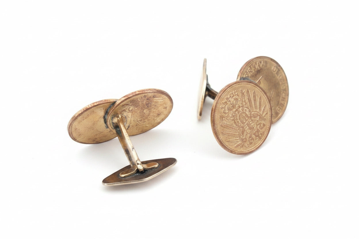 A pair of cufflinks, HP 835, featuring 1-pfennig coins from the German Empire