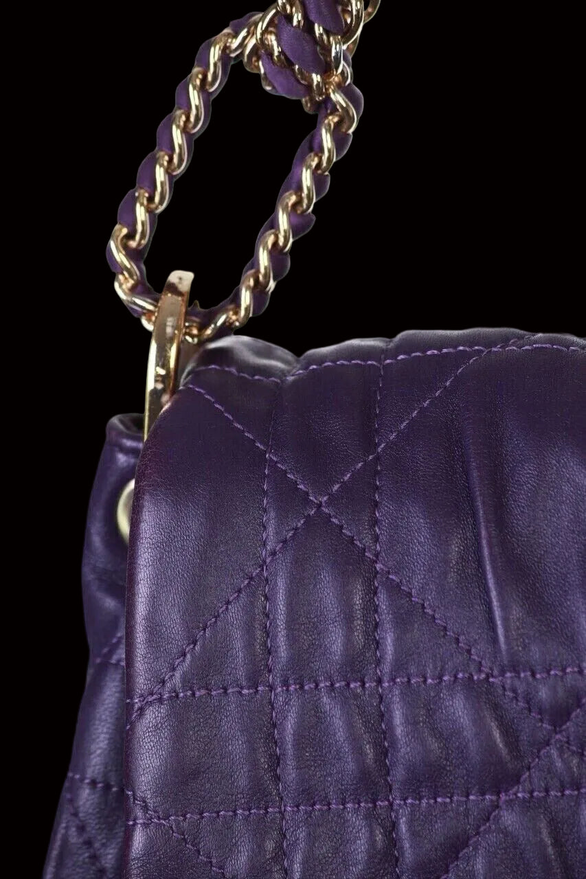 Dior Cannage bag side detail — gold chain link and quilted lambskin