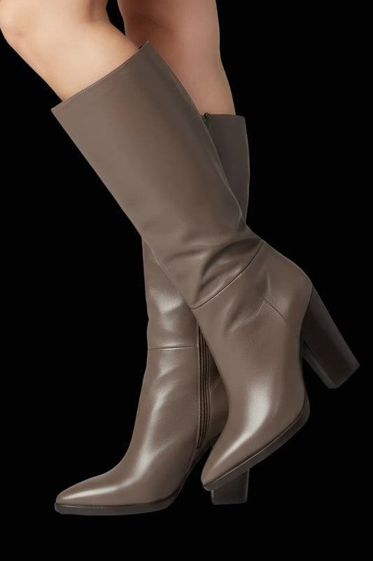Prada leather knee-high boots in espresso — rent from Laura Messerschmitt, Berlin stylist