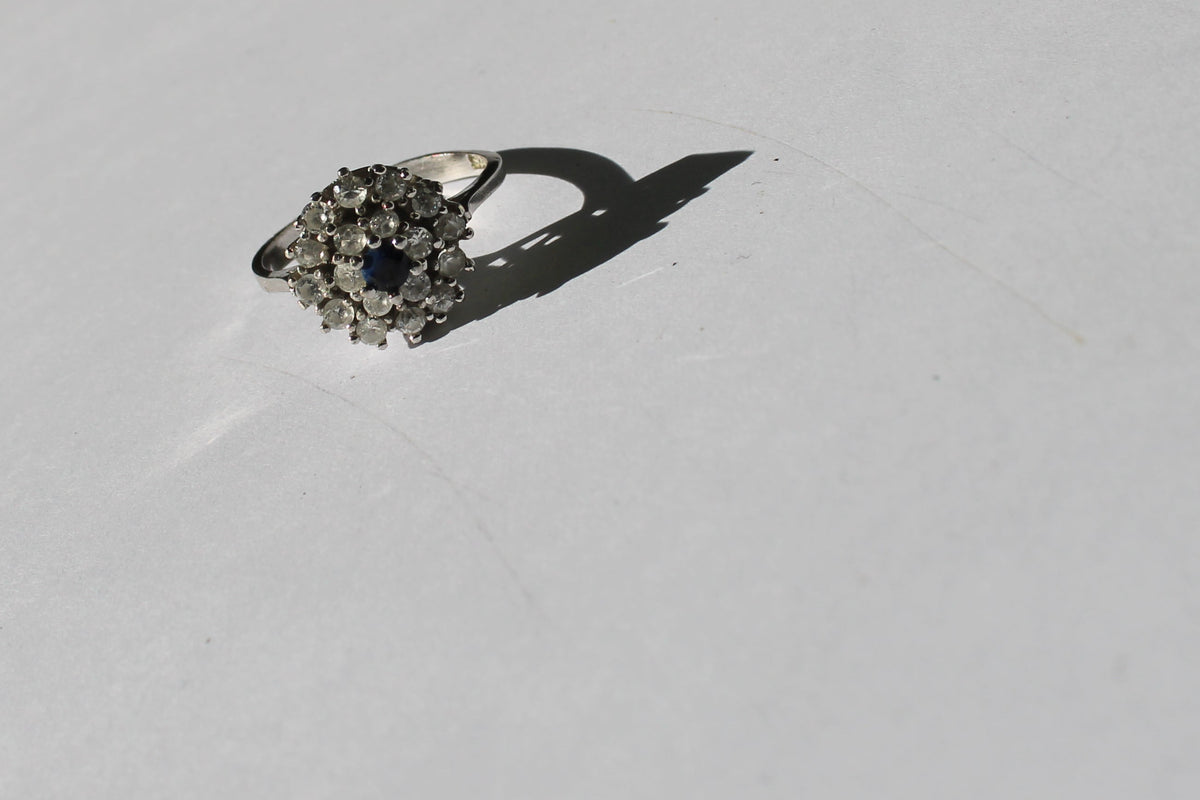 Sterling Silver Ring with Blue Centre Stone & Cubic Zirconia – Size 52