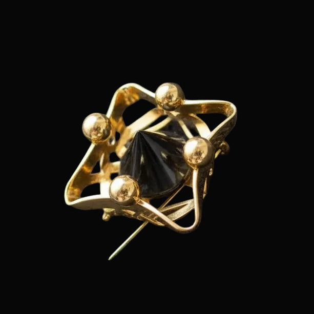 Loewe vintage gold-tone brooch with carved onyx — rent from Laura Messerschmitt, Berlin stylist
