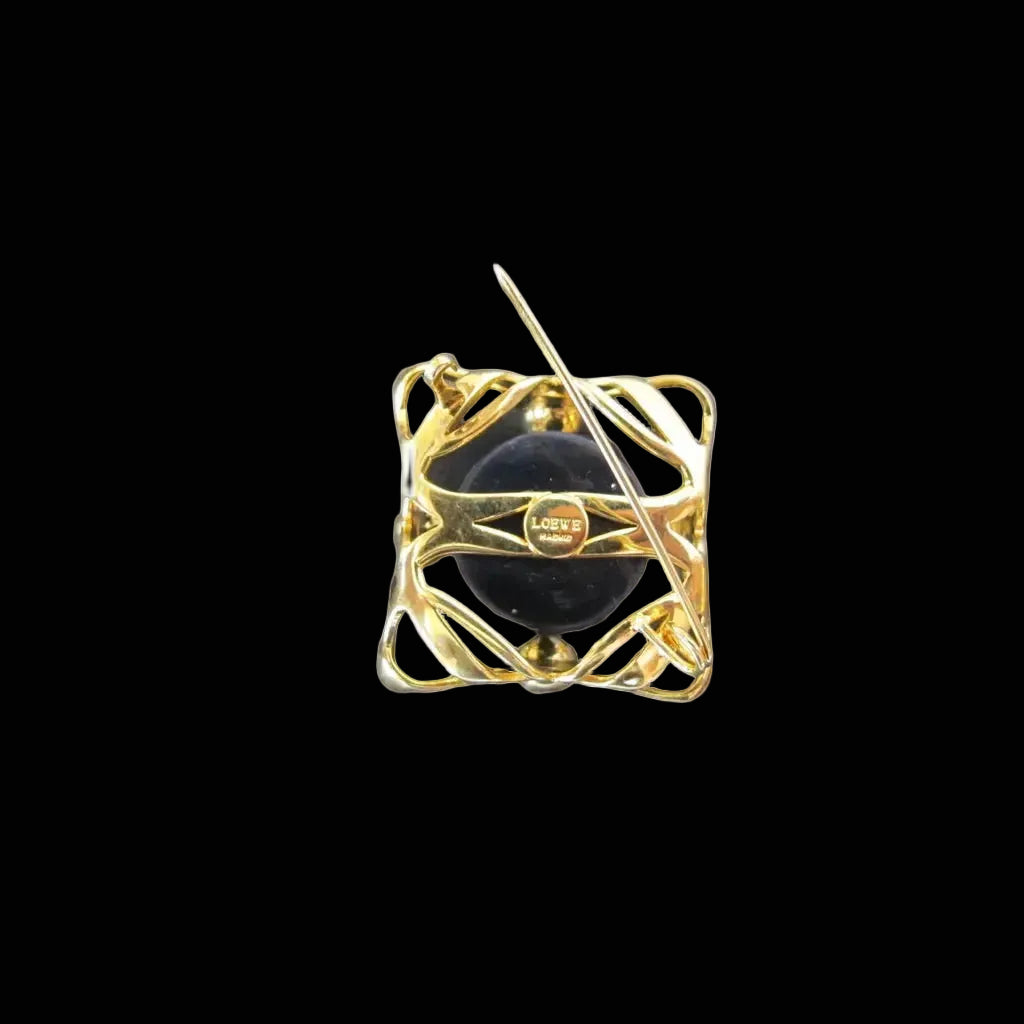 Vintage gold-tone brooch — pin back closure