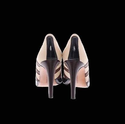 Manolo Blahnik tricolor ankle booties — rear view showing stiletto heel and stripe detail