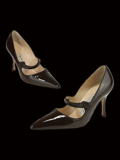 Manolo Blahnik brown patent leather Mary Jane pumps — back view