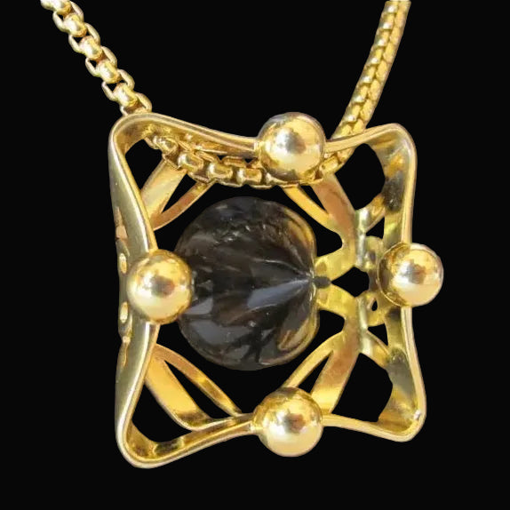 Loewe vintage gold chain necklace with carved onyx pendant — rent from Laura Messerschmitt, Berlin stylist