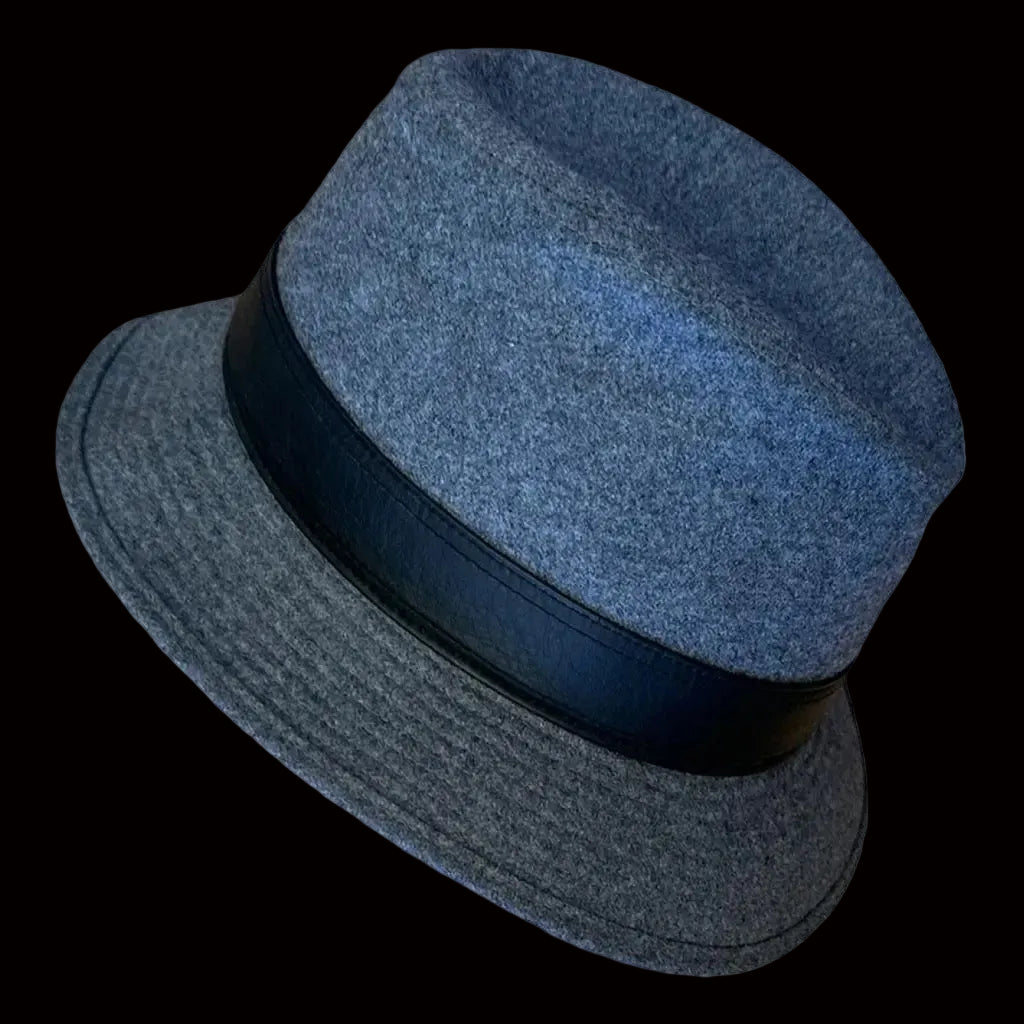 Hermès grey wool felt fedora with black leather band, top-down view on white background