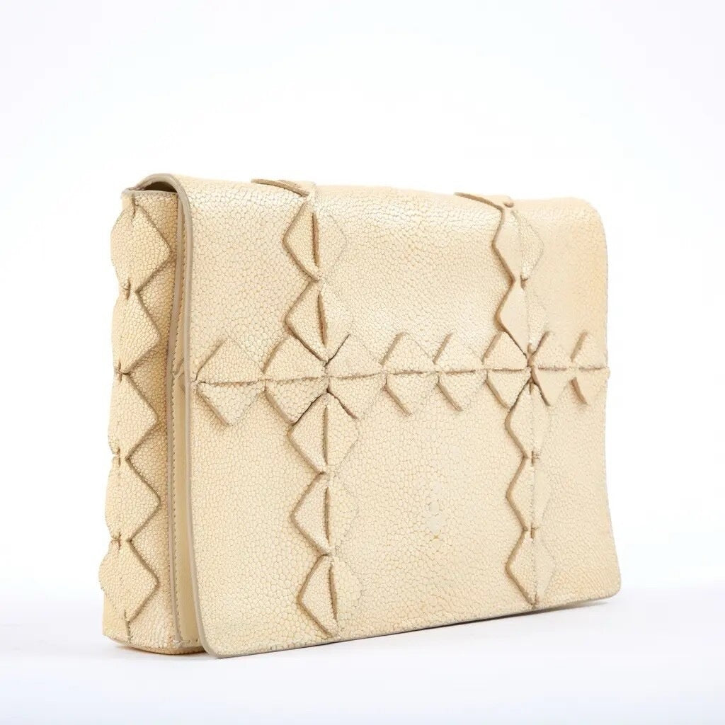 Salvatore Ferragamo — Beige Stingray Leather Clutch — side view | Rent designer fashion at Laura Messerschmitt Berlin