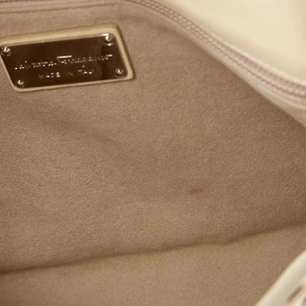 Salvatore Ferragamo — Beige Stingray Leather Clutch — view 8 | Rent designer fashion at Laura Messerschmitt Berlin