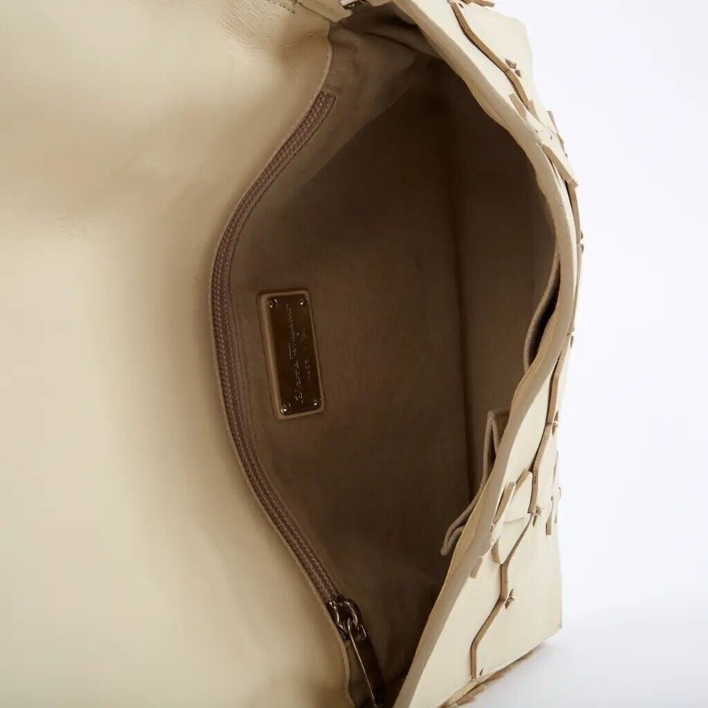 Salvatore Ferragamo — Beige Stingray Leather Clutch — close-up detail | Rent designer fashion at Laura Messerschmitt Berlin