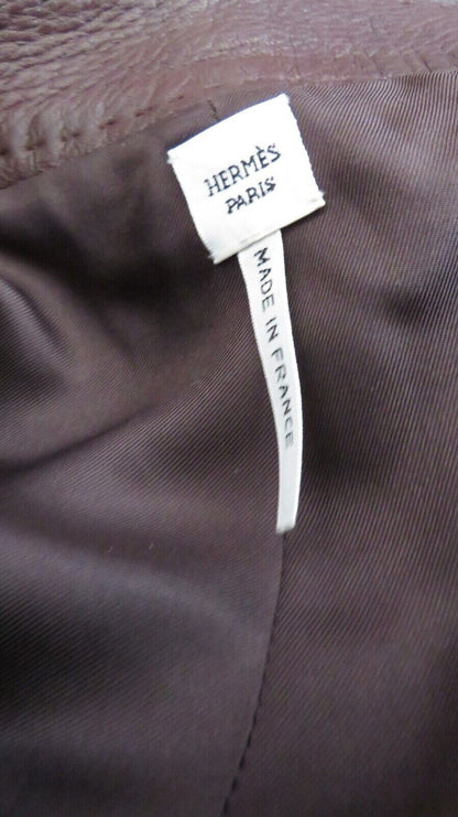Hermès Paris label with Made in France marking inside dark brown leather trousers