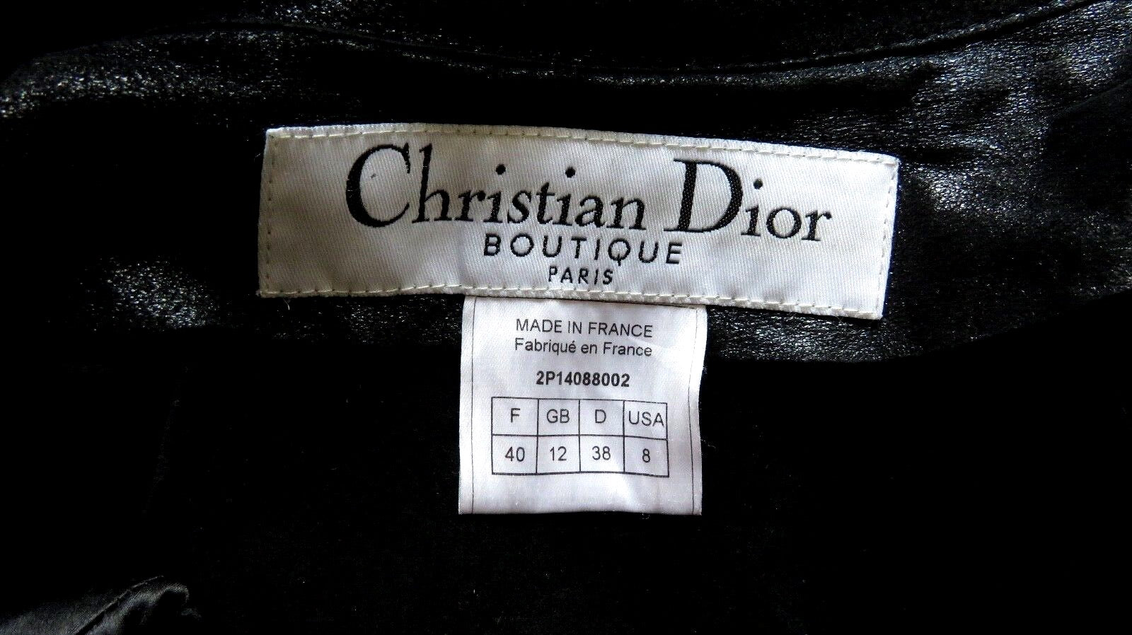 Christian Dior goatskin trench coat front view — double-breasted with silver D-ring hardware