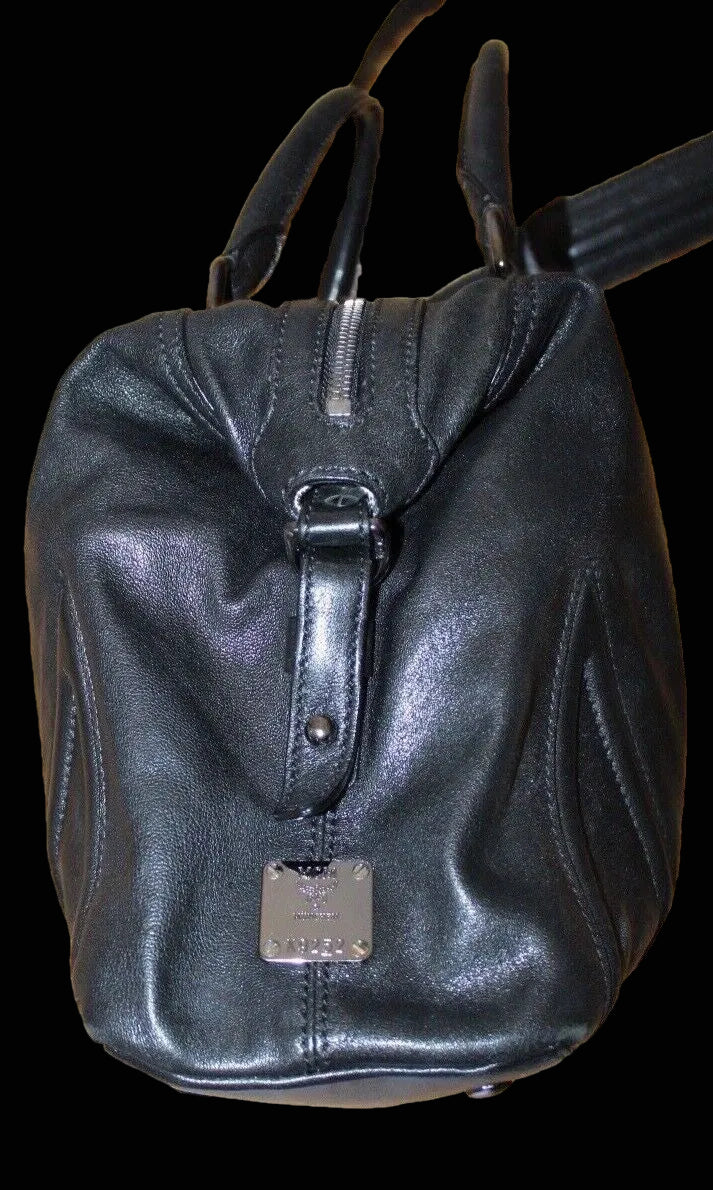 MCM leather bag logo plaque detail