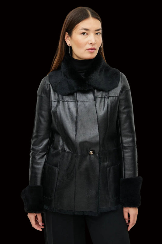 Chanel black lambskin leather jacket with shearling trim gold CC button front view