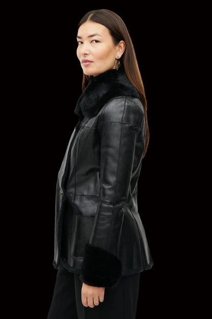 Chanel black lambskin leather jacket with shearling trim gold CC button back view