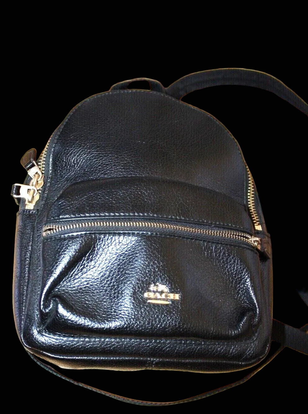 Coach black leather backpack detail view