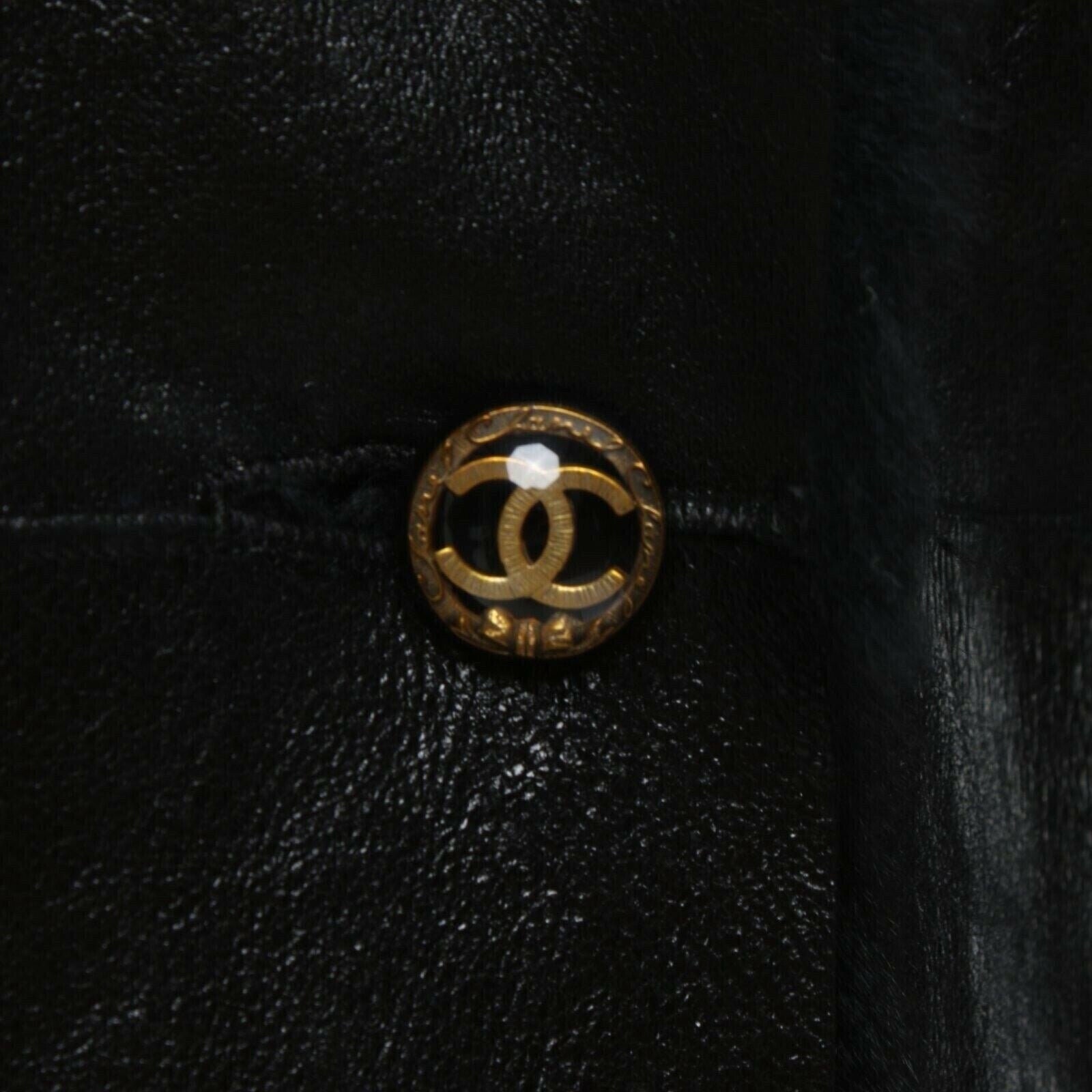 Chanel black lambskin leather jacket with shearling trim gold CC button side view