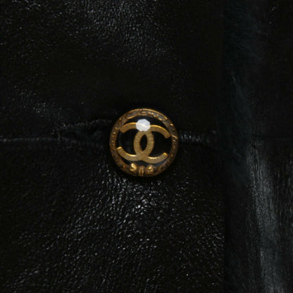 Chanel black lambskin leather jacket with shearling trim gold CC button side view