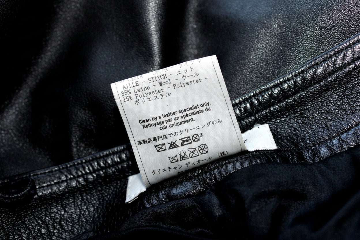 Care label — 85% Wool 15% Polyester knit cuffs, clean by leather specialist only