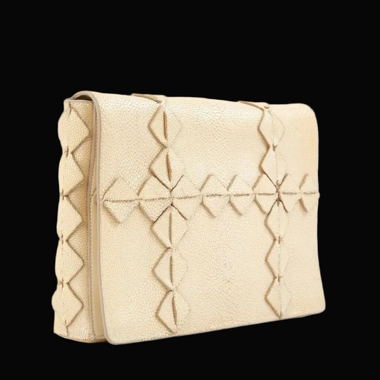 Salvatore Ferragamo beige stingray leather clutch — rent from Laura Messerschmitt, Berlin stylist